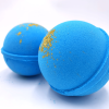 Grapefruit bath bomb with gold shimmer